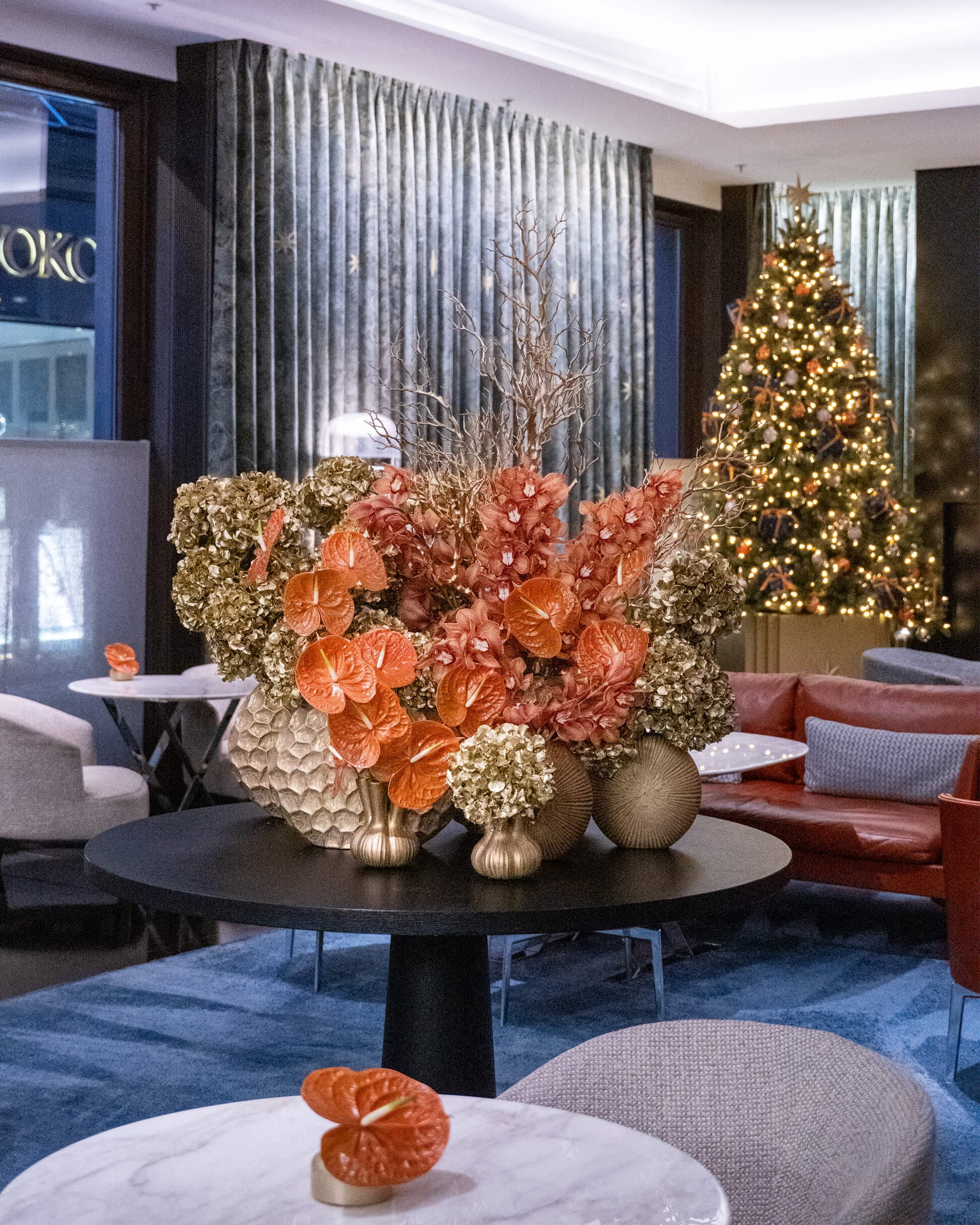 Christmas trees, flowers and festive foliage.