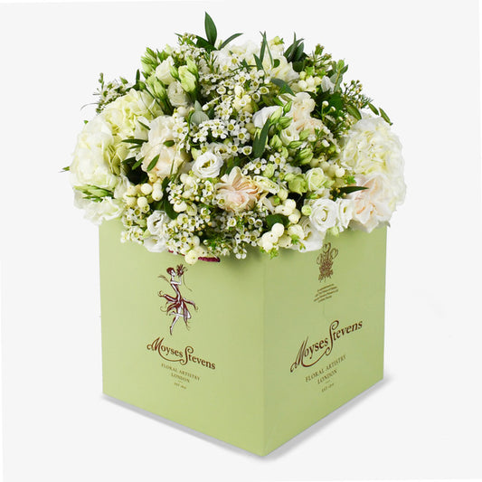 Event After In Mayfair luxury flower bouquet by Moyses Stevens UAE featuring pristine white roses and soft hydrangeas adding a touch of grandeur.