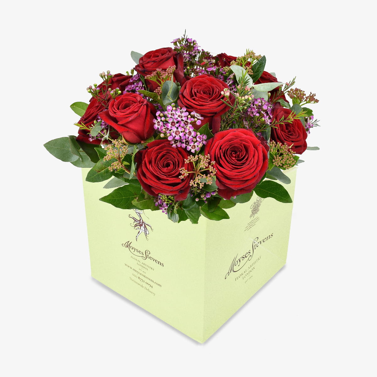 Dozen Red Roses luxury flower bouquet by Moyses Stevens UAE featuring red roses, pink wax flower, skimmia & eucalyptus