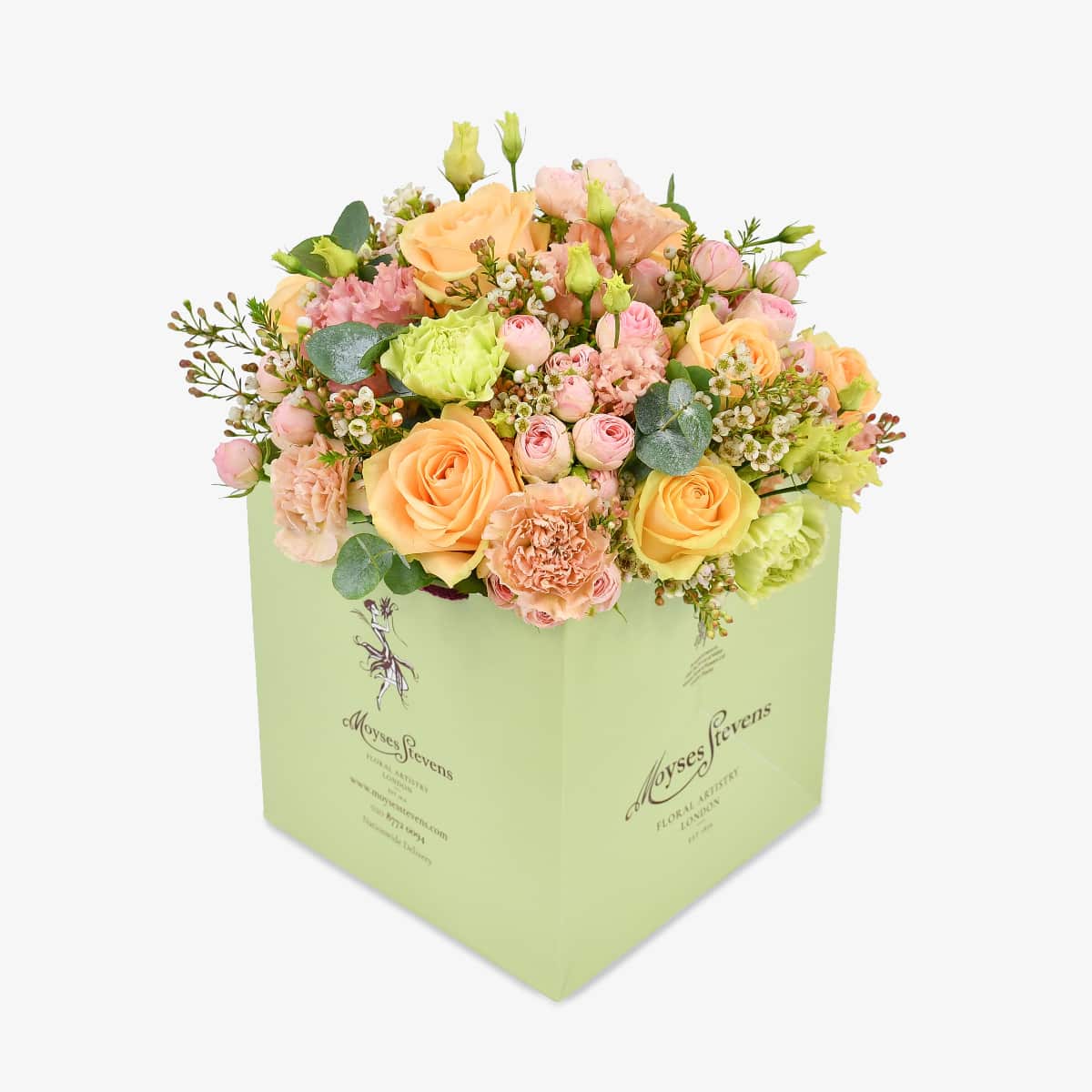 Just peachy luxury flower bouquet by Moyses Stevens UAE featuring a blend of peach and pink roses with eucalyptus and waxflower.