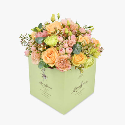 Just peachy luxury flower bouquet by Moyses Stevens UAE featuring a blend of peach and pink roses with eucalyptus and waxflower.