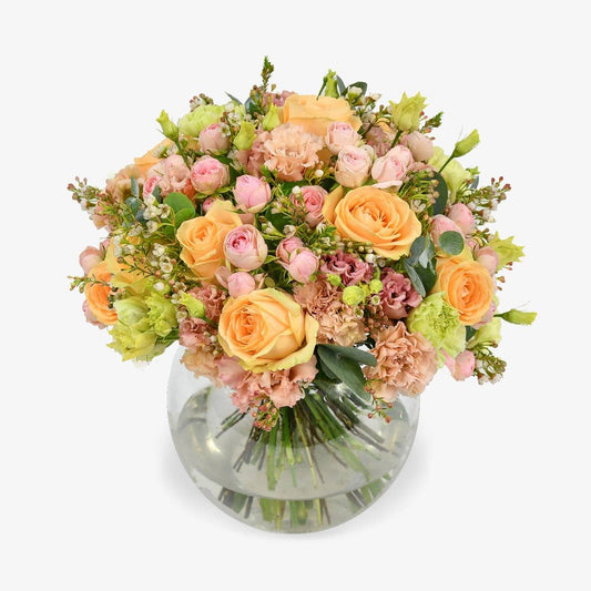 Just peachy luxury flower bouquet by Moyses Stevens UAE featuring a blend of peach and pink roses with eucalyptus and waxflower.