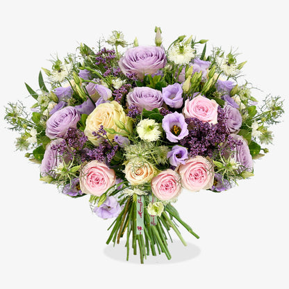 lilac charm luxury flower bouquet by Moyses Stevens UAE featuring pastel roses, lilac lisianthus and purple limonium.