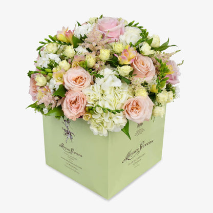 Melody luxury flower bouquet by Moyses Stevens UAE featuring Soft pastel pinks paired with crisp white blooms