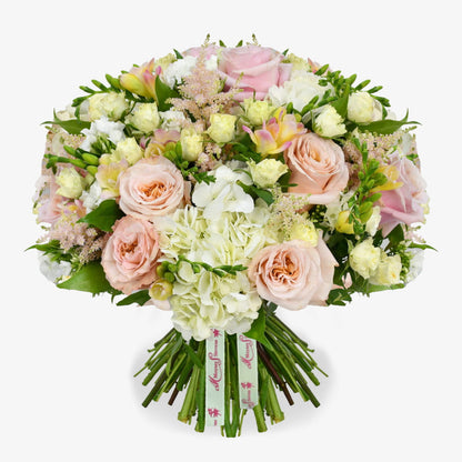 Melody luxury flower bouquet by Moyses Stevens UAE featuring Soft pastel pinks paired with crisp white blooms
