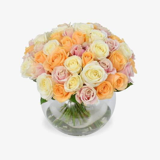 Pastel Perfection luxury flower bouquet by Moyses Stevens UAE featuring soft shades of pink, peach, and cream roses.