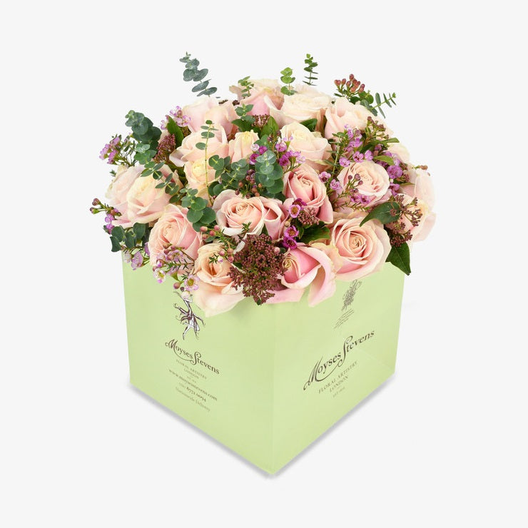 Pink delight luxury flower bouquet by Moyses Stevens UAE featuring pink roses, fragrant eucalyptus, and delicate pink wax flowers.