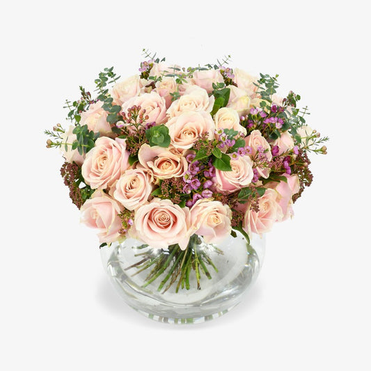 Pink delight luxury flower bouquet by Moyses Stevens UAE featuring pink roses, fragrant eucalyptus, and delicate pink wax flowers.