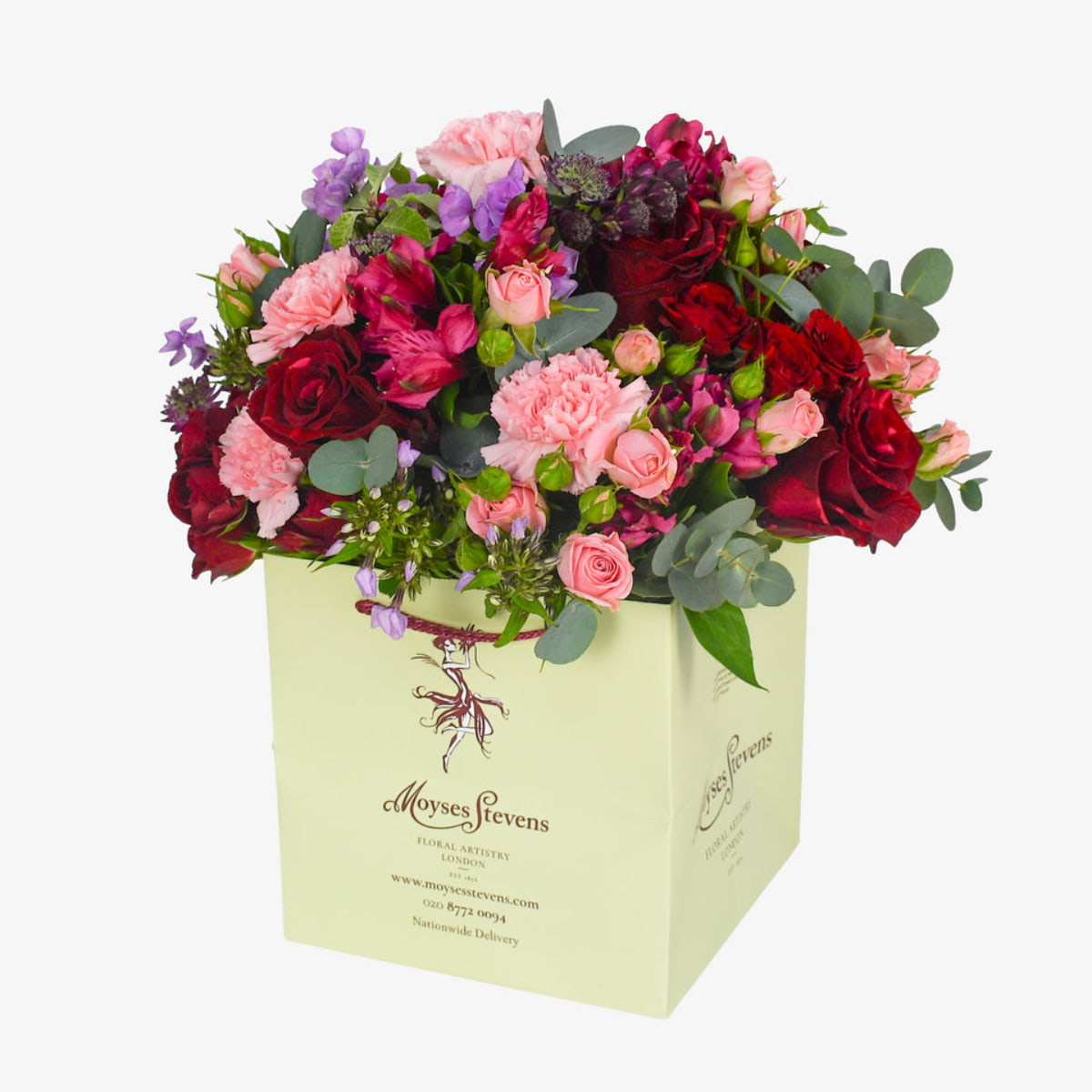 Plush Passion luxury flower bouquet by Moyses Stevens UAE featuring red roses, pink and red spray roses, pink alstroemeria, astrantia and purple phlox.