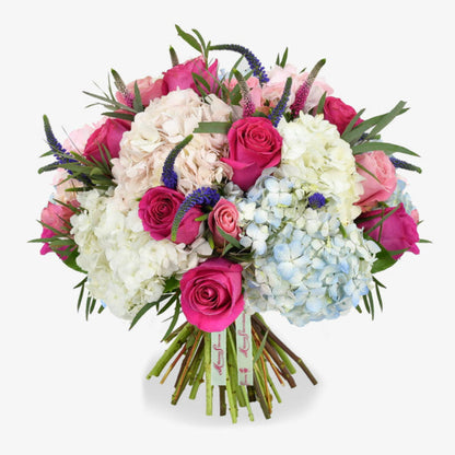 Smoothie luxury flower bouquet by Moyses Stevens UAE featuring Pink Hydrangea, White Hydrangea, Blue Hydrangea, Hot Pink Roses, Soft Pink Roses, Pink Veronica, Purple Veronica, Seasonal Greenery