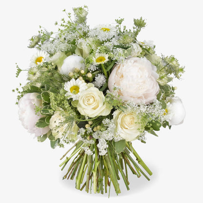 Summer Elegance luxury flower bouquet by Moyses Stevens UAE featuring pure white peonies, daisies, gypsophila, white roses and green and white pittosporum.