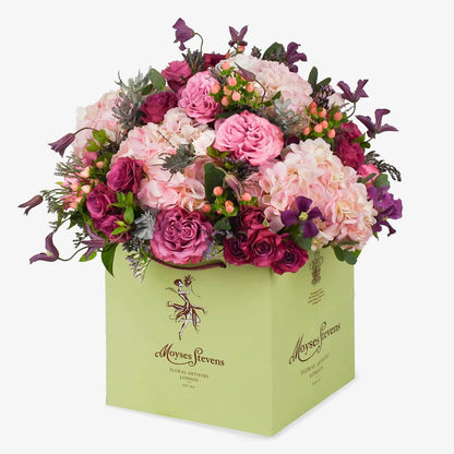 Café au Soleil luxury flower bouquet by Moyses Stevens UAE featuring Blues roses alongside the vibrant energy of hot pink spray roses and the dreamy softness of pink hydrangeas.
