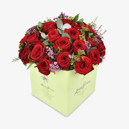 three dozen red roses luxury flower bouquet by Moyses Stevens UAE featuring Roses, Waxflower, Viburnum, Eucalyptus